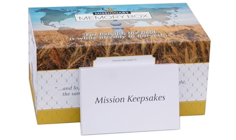 Missionary Memory Box keepsake displayed with journals and mission mementos